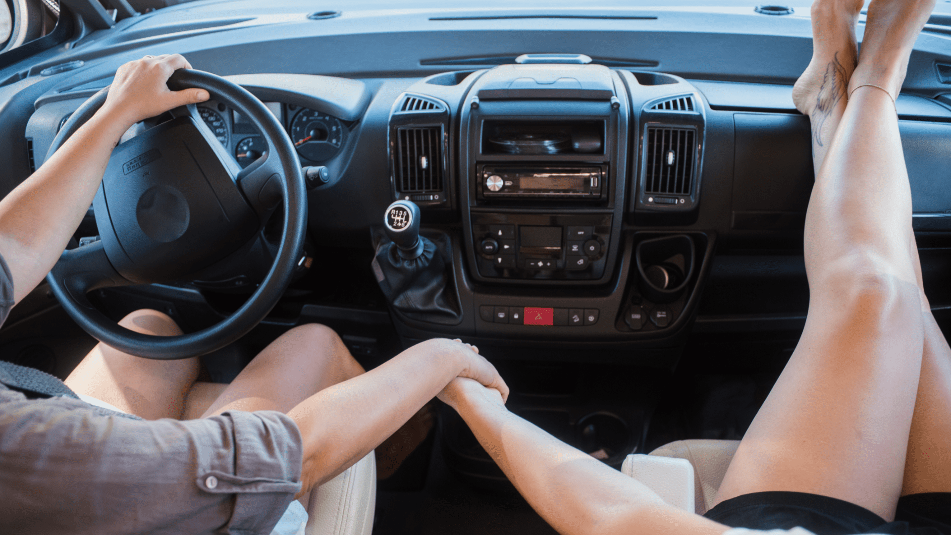 Road trip snacks image of people in a car.